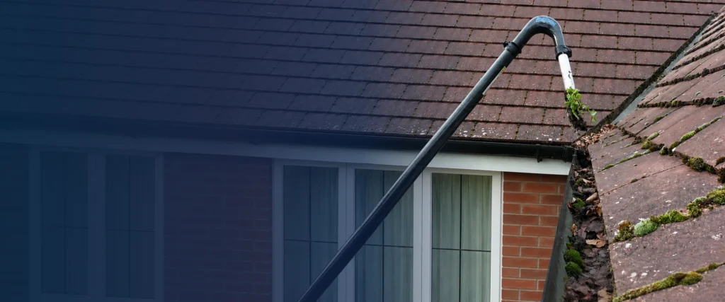Pure Horizon clearing gutters on a Suffolk home using a SkyVac system