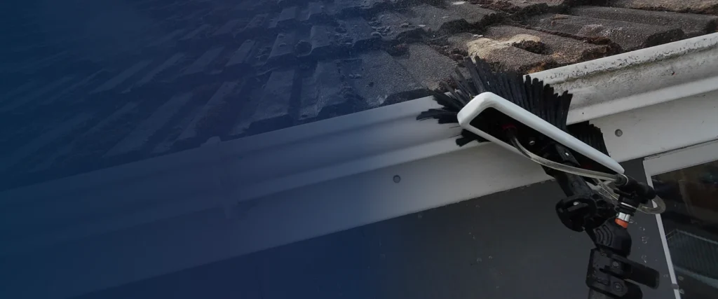 Pure Horizon cleaning external guttering, fascias and soffits using professional water-fed equipment in Suffolk